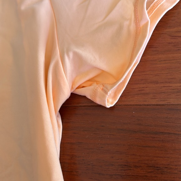 Bright peach short sleeve SKIMS top - Picture 5 of 8